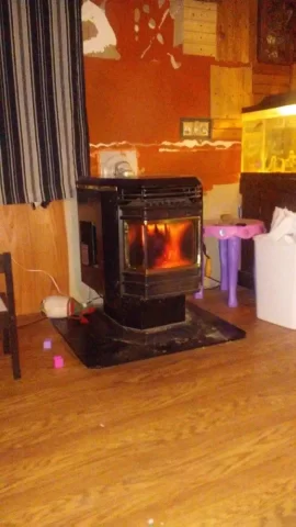[Hearth.com] Black glass on pellet stove
