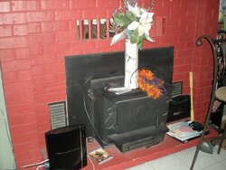 installing whitfield pellet stove using our current fireplace and chimney (heatilater???)  PICS INCL