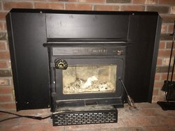 Insert for a fireplace