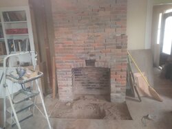 Early 1900s fireplace restoration...why is there a big wooden box under the hearth???