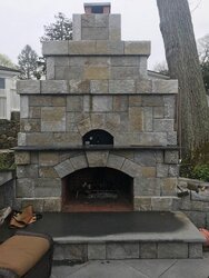 Pizza oven over fireplace.  Poor draw.