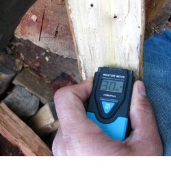 MOISTURE METER SAYS DRY BUT WOOD IS HISSING AND LEAKING