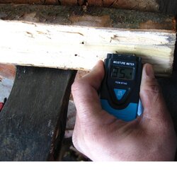 MOISTURE METER SAYS DRY BUT WOOD IS HISSING AND LEAKING