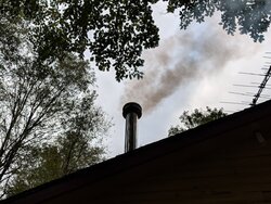 Smoke from chimney WITH hot fire??