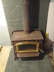 Wall material behind wood stove