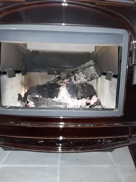 [Hearth.com] How to clean glass and can't get low temp on Blaze King