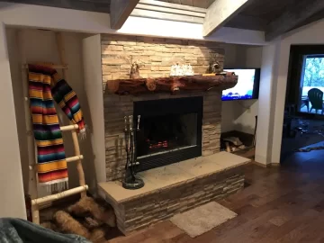 Large open sided concrete fireplace help