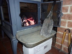 Cleaning ash from firebox