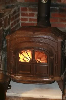 [Hearth.com] Insulation stuffed up the chimney around the pipe