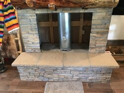 Large open sided concrete fireplace help
