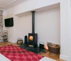 Looking for advice for potential stove surround