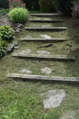 Landscaping a walkway: grassy to stones