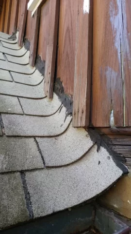 Roofing question..gable porch roof into vertical board and batten?