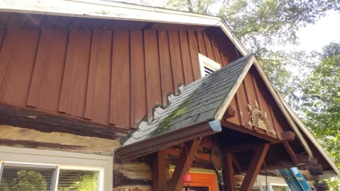 Roofing question..gable porch roof into vertical board and batten?