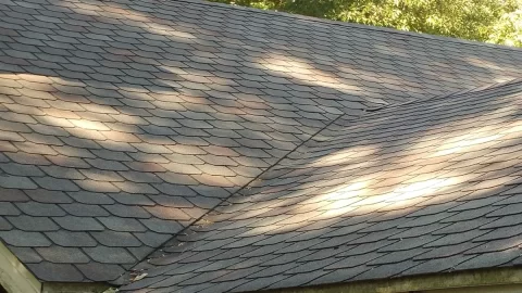 Roofing question..gable porch roof into vertical board and batten?