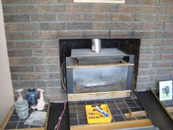 How deep can a stove go into fireplace opening