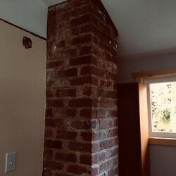 what would you do -alter old brick chimney or new put stainless ?