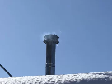 [Hearth.com] Chimney dripping brown stuff on new metal roof - concerned of damage and root cause