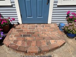 Mortar or thin-set mortar for filling brick joints in hearth pad?