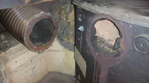[Hearth.com] Stove collar/spigot melted