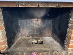 Trying to replace old metal lined fireplace