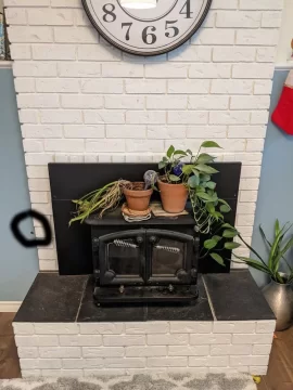 Just moved in. Should I get this old stove working again? Convert back to traditional fireplace?