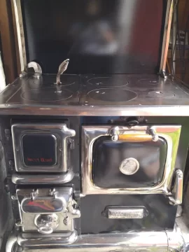 Change out an Elmira Sweetheart stove door for a glass door?