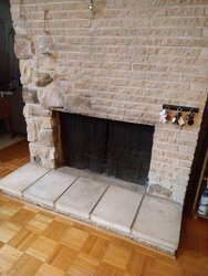 Converting double sided wood burning fireplace with gas starter to gas stove question.