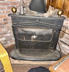 Need help identifying this old stove and love to sell it.