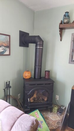 Replacing my Propane  Stove with a wood burner, need chimney help . . .