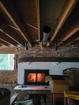 [Hearth.com] How to tie in fireplace heat duct?