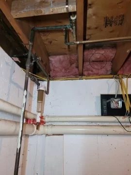 Installing wood stove in unfinished basement: Chimney clearance questions