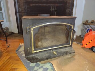 Hoping for help identifying wood stove