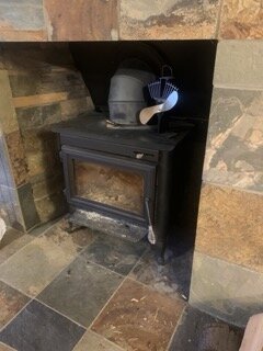 New homeowner wood stove through chimney question