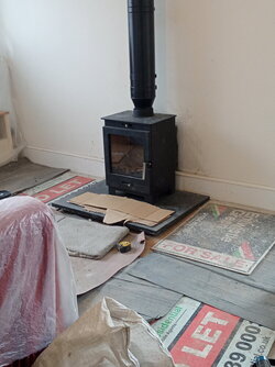 Granite hearth layable directly over LVT tiling?