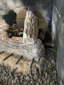 Fireplace converted to gas - can I burn wood?