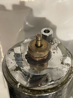 Insinkerator top spout broke and replacement part had no brass nut and ferrule for water line connection!