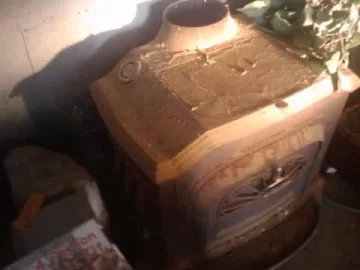 [Hearth.com] What kind of stove is this in my garage? (Vermont Castings Resolute, I guess?)