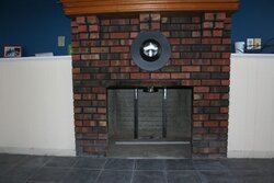 Blocking off old fireplace opening?