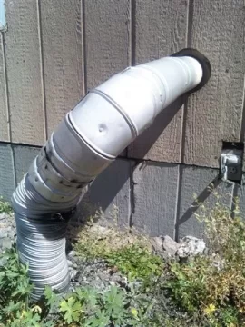 [Hearth.com] odd venting, pipe is vented into the dirt!!