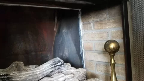 Insert suggestions for odd fireplace