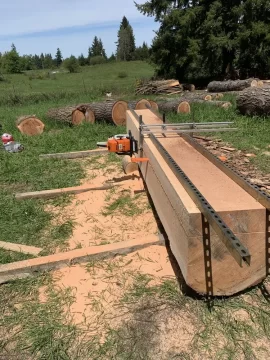 Stihl 661 on Logosol chainsaw mill without side cover?