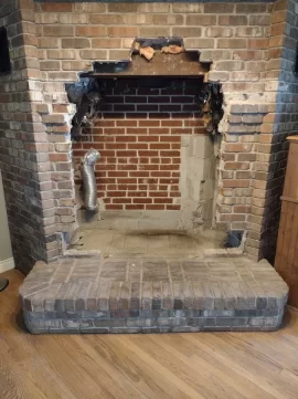 Install of Freestanding Stove in Brick Alcove