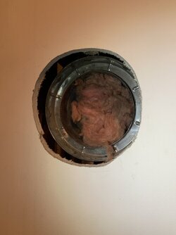 Connecting a new woodstove to an existing interior chimney through 1/2 inch drywall...