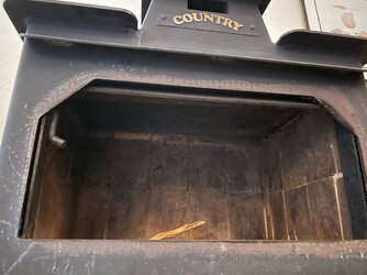 Where does the Baffle/smoke deflector go in a 1986 Country Wood Stove