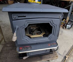 Need help identifying the model of this old wood stove