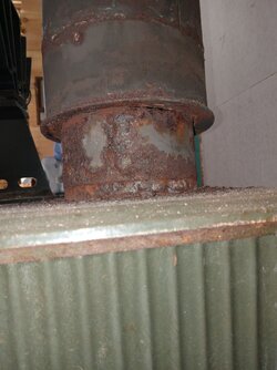 Gap between wood stove/single wall chimney