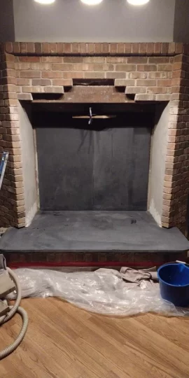 Install of Freestanding Stove in Brick Alcove