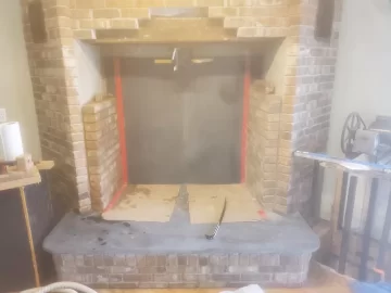 Install of Freestanding Stove in Brick Alcove