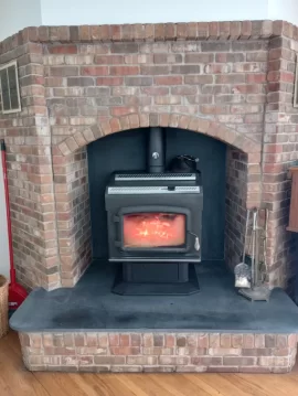 Install of Freestanding Stove in Brick Alcove